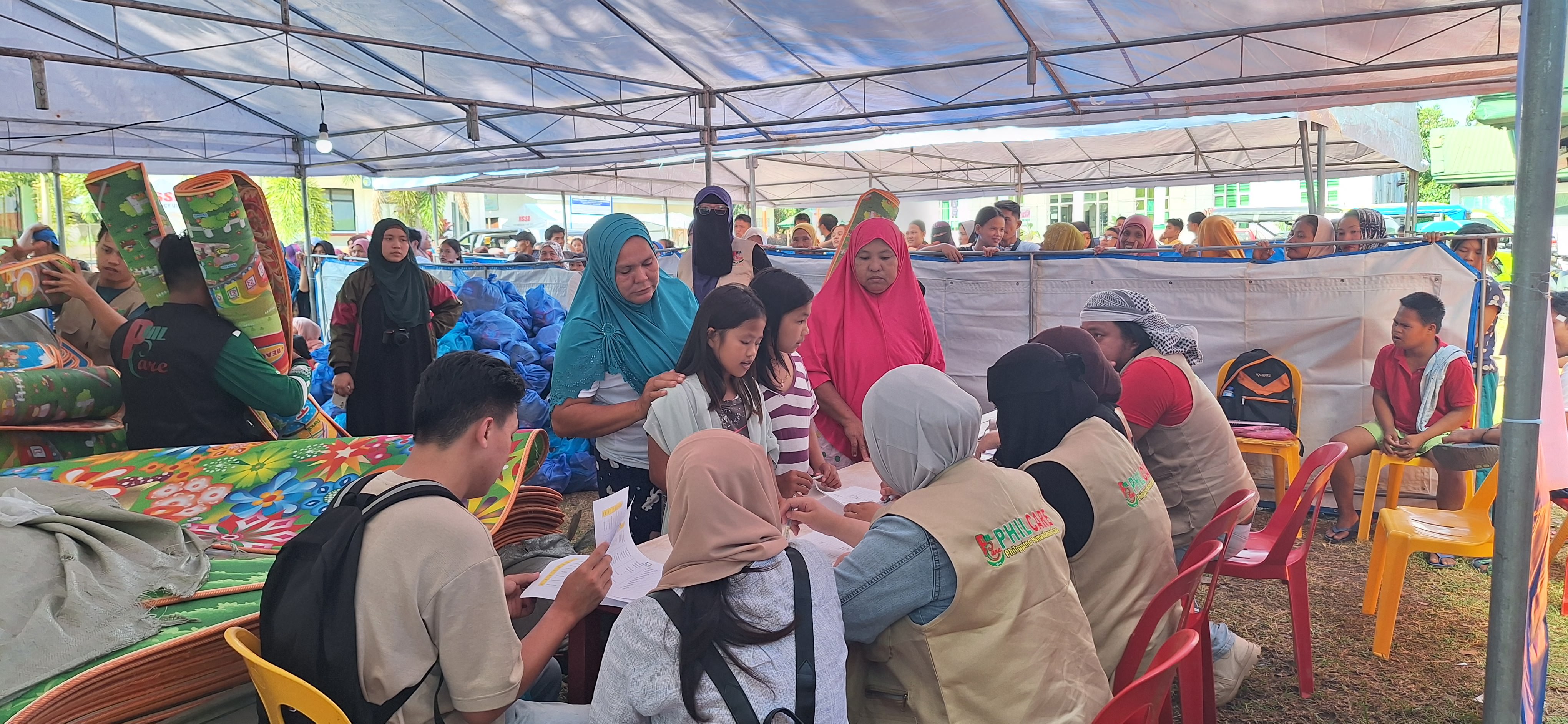 PHILCARE Provides Relief to 704 Families Affected by Flash Floods and Landslides — PHILCARE news.